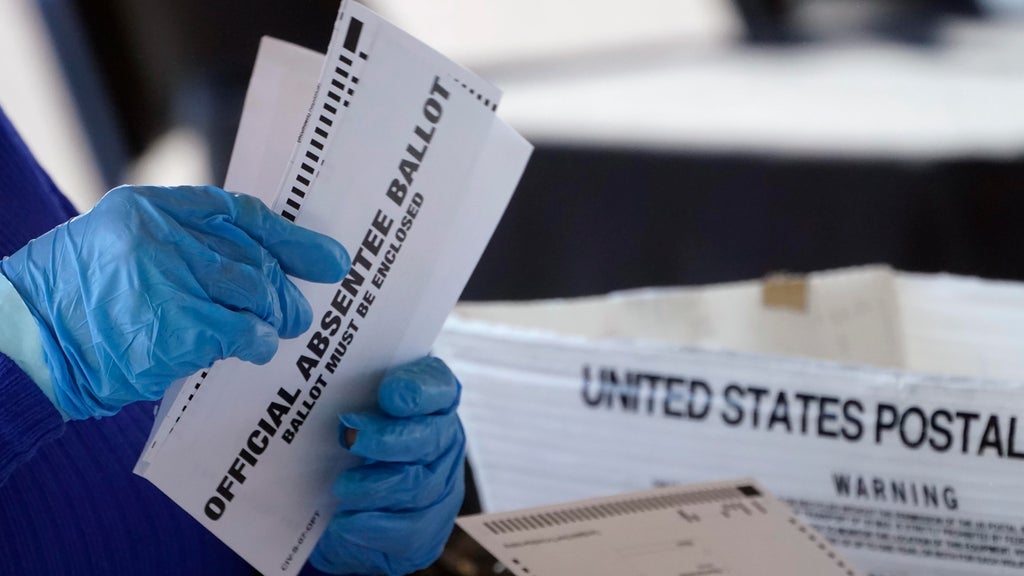 Absentee ballot issues may disenfranchise thousands of metro Atlanta voters, lawsuit claims — Rome Community news